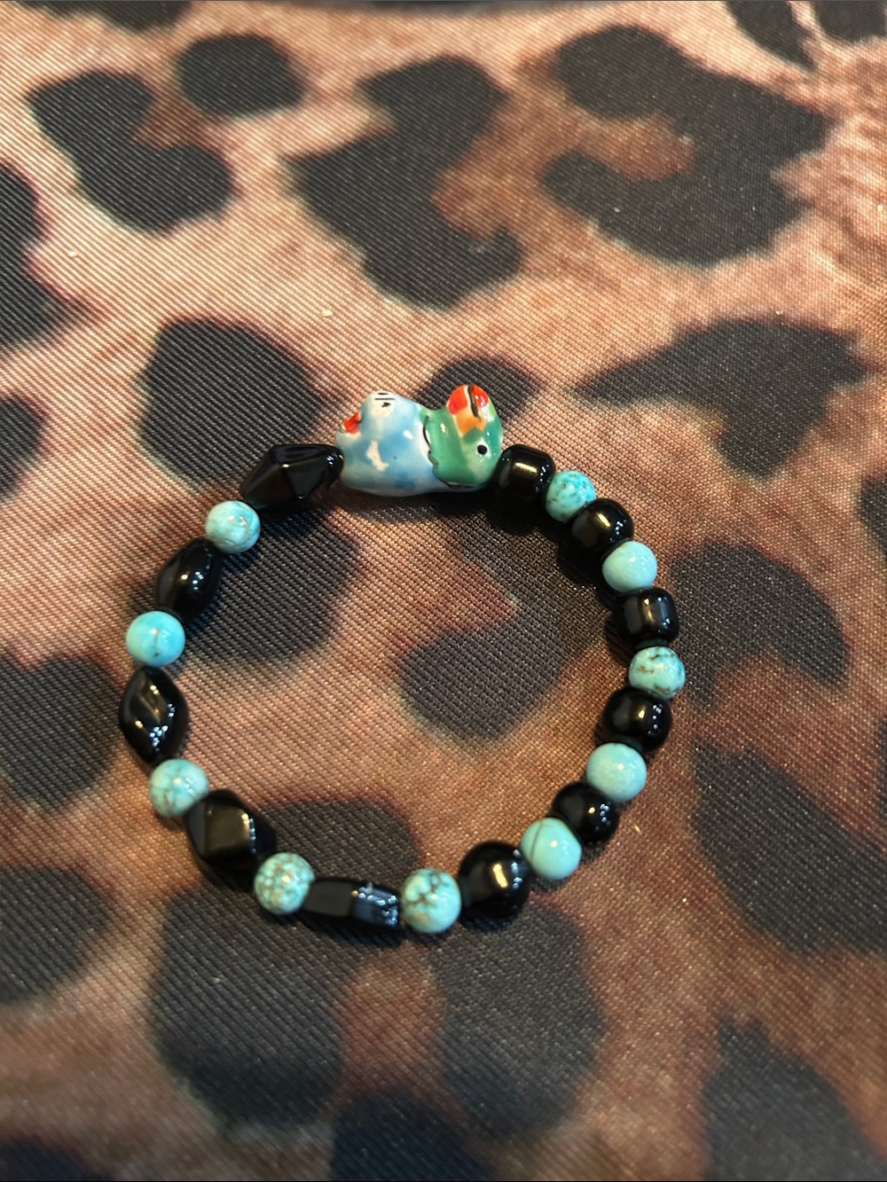 Hand Crafted Turquoise & Black Beaded Bracelet with Ceramic Bird Accent